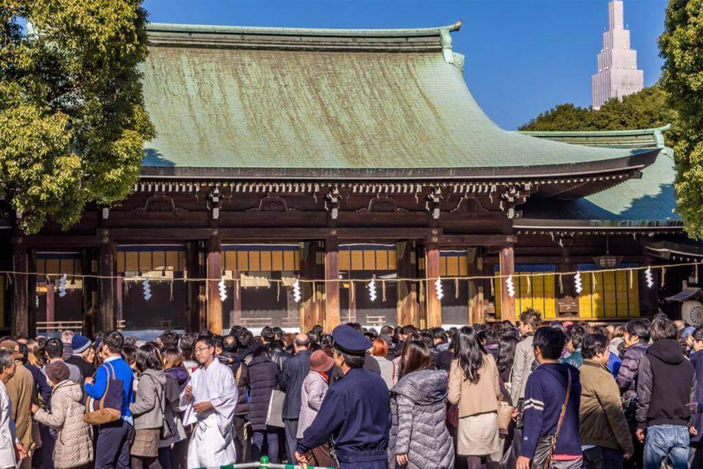 Crowd of Hatsumode at Asakusa in Tokyo, Japan . Hatsumode is the first Shinto shrine or Buddhist temple visit of the Japanese New Year = Shutterstock