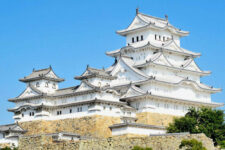Himeji castle which shines in a blue sky, Himeji city, Hyogo prefecture,Japan. Himeji castle is one of the World Cultural Heritage. = Shutterstock