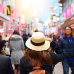 On February, asian woman is enjoy traveling at Harajuku street market in Tokyo, Japan = Shutterstock