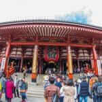 Outdoor panoramic scenic view of front enter Sensoji shrine crowded with queuing believers in Sensoji temple on March, Asakusa, Tokyo = Shutterstock