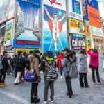 The Glico Man billboard and other light displays at Dontonbori, Namba Osaka area, Osaka, Japan. Namba is well known as an entertainment area in Osaka = Shutterstock