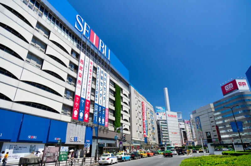 "Ikebukuro" station east exit scenery. There is "Seibu Department Store" in the station building = shutterstock