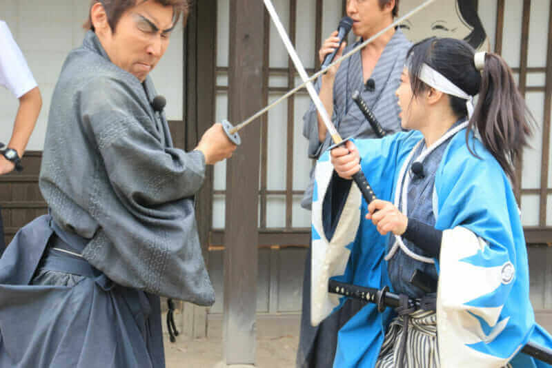 The Toei movie village in Kyot ,Uzumasa.The demonstration which shows a duel between the samurais with a sword = shutterstock