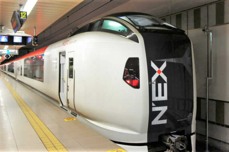 The high speed Narita Express international airport access train (NEX) by JR East Japan Railway Company connects Narita Airport to Central Tokyo and Yokohama = shutterstock
