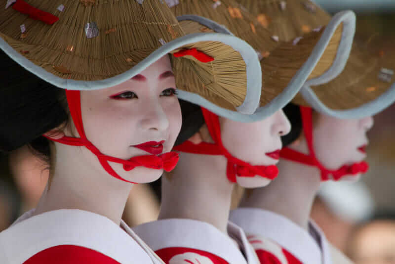 Unidentified Maiko girl (or Geiko lady) on parade of hanagasa in Gion Matsuri (Festival) held on July 24 2014 in Kyoto = shutterstock