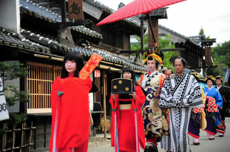 Geisha parade at Edo Wonderland in Nikko Edomura Edo Wonderland is a history theme park recreating Japanese town life during the Edo Period 1603-1868 = shutterstock