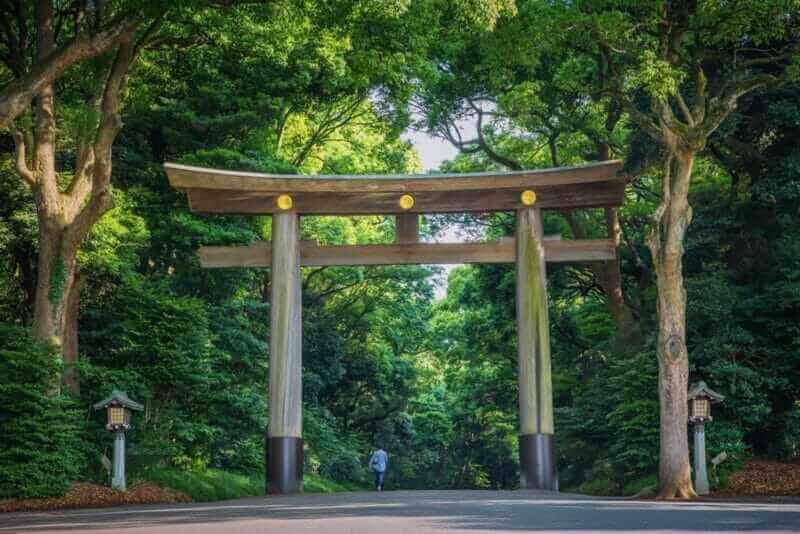 Entrance at Meiji-jingu temple in Central Tokyo, Japan = shutterstock
