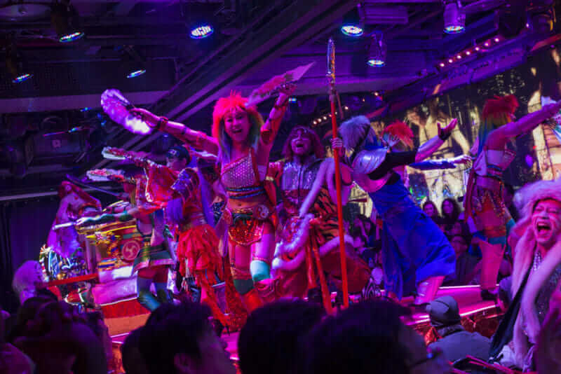 Performance and parade with actors, actresses and fantastic robots during a show at the robot restaurant. Shinjukunishiguchi district in Tokyo, Japan = shutterstock