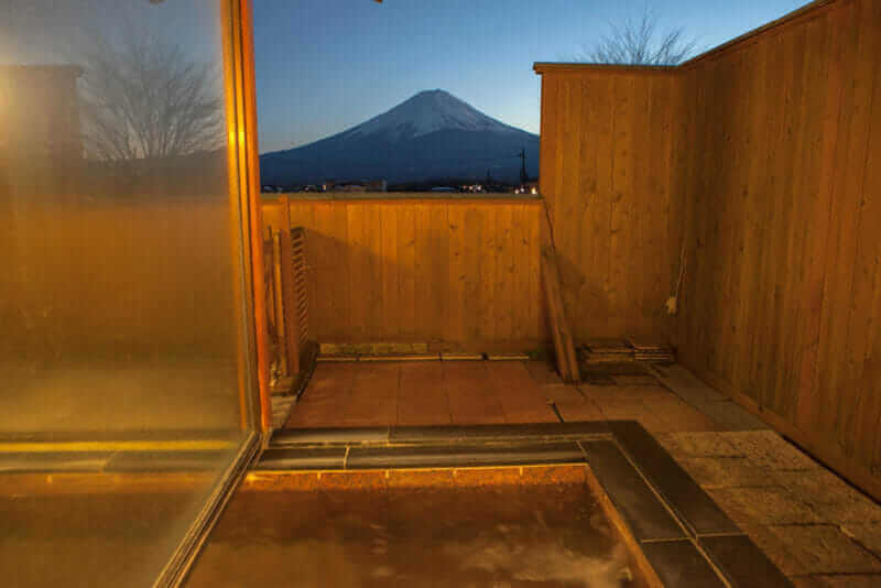 Japaneses onsen and Mount Fuji view = shutterstock