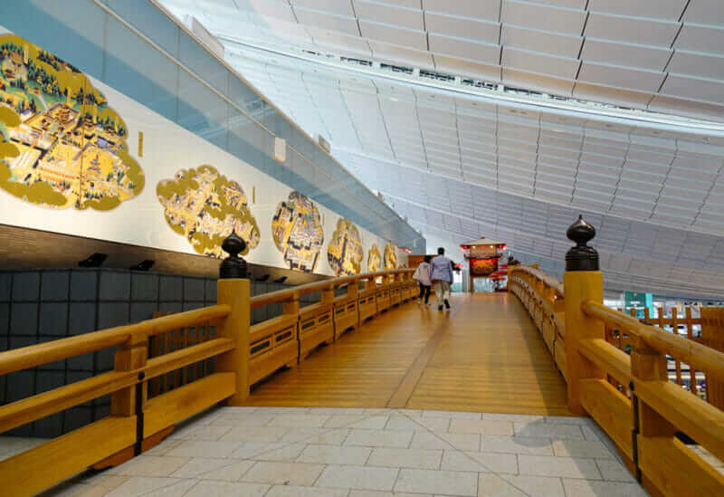 A wooden bridge for decorations at Haneda Airport in Tokyo, Japan. Haneda was the third busiest airport in Asia and the fifth busiest in the world = shutterstock