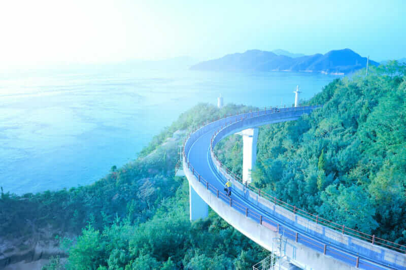 Shimanami Kaido expressway and cycling route links Onomichi Hiroshima prefecture with Imabari Ehime Prefecture that links the island of the Seto sea = shutterstock