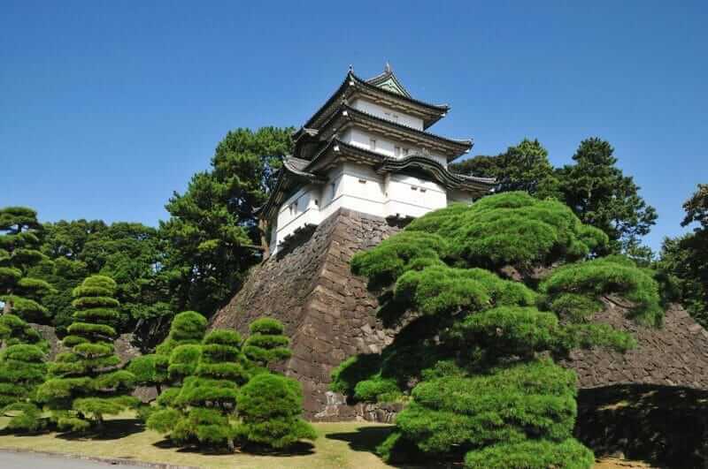 Ancient castle style Fujimi-yagura guard tower building at Tokyo Imperial Palace in Japan = AdobeStock