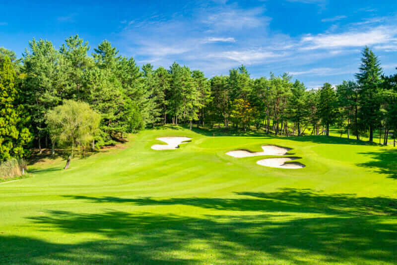 Panorama view of Golf Course where the turf is beautiful and green in Ibaraki Prefecture, Japan. Golf course with a rich green turf beautiful scenery = shutterstock