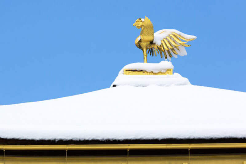 On the roof of the Golden Pavilion, the legendary bird "Houou" shines, Kyoto, Japan = shutterstock