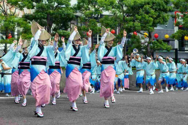 AWA ODORI. One of the traditional Japanese dances at the Obon festival. The largest dance festival in Japan. The City Of Tokushima = shutterstock