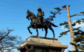 Statue of Masamune Date (the lord of Tohoku region in the Sengoku era) in Sendai castle park (or Aoba castle) on Mount Aoba = shutterstock