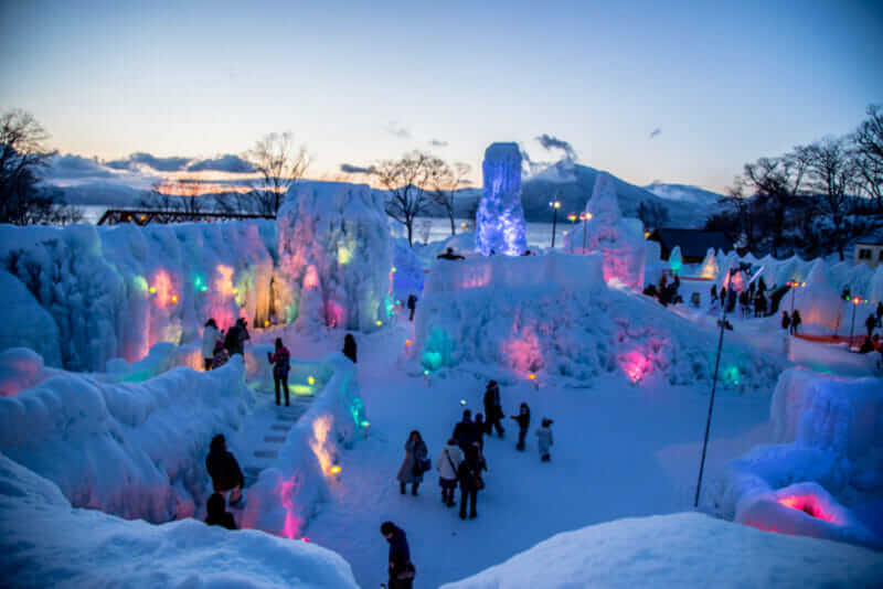 Lake Shikotsu Ice Festival is an ice sculpture event held in Lake Shikotsu hot springs, Hokkaido, Japan = shutterstock