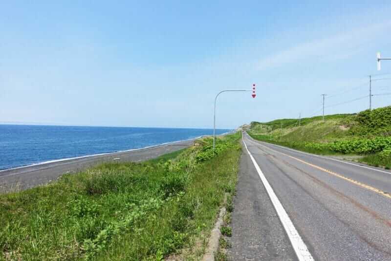 Ororon line road along Sea of Japan, in Hokkaido, Japan = shutterstock