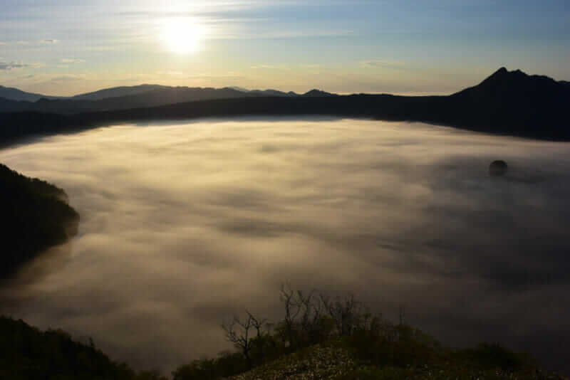 Lake Mashu is famous for being often wrapped in a mysterious fog = shutterstock