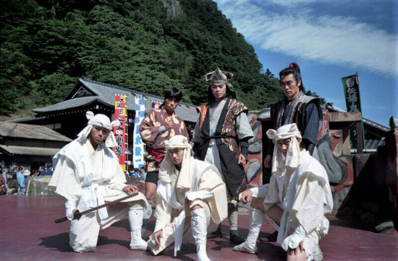 Ninjas after a performance in Edomura, Japan. Edomura is Japan's most favorite theme park with ninjas and samurais. A big surprise for children = shutterstock