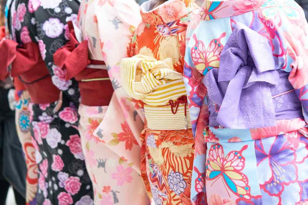 Many people wear yukata (summer kimono) during the Gion Festival = Shutterstock