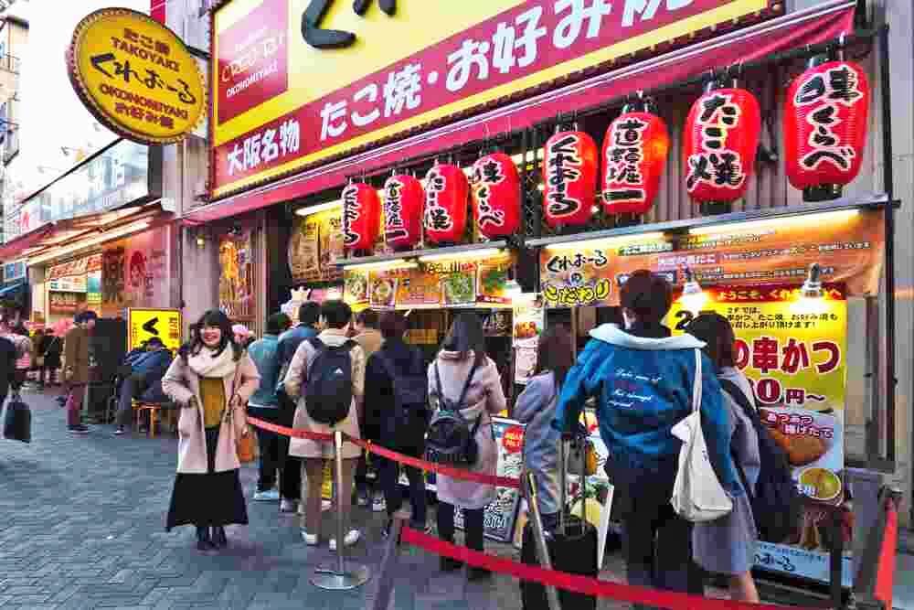 February 28, 2017: Osaka Shopping Area,Street scene in Shinsaibashi town, Japan = Shutterstock
