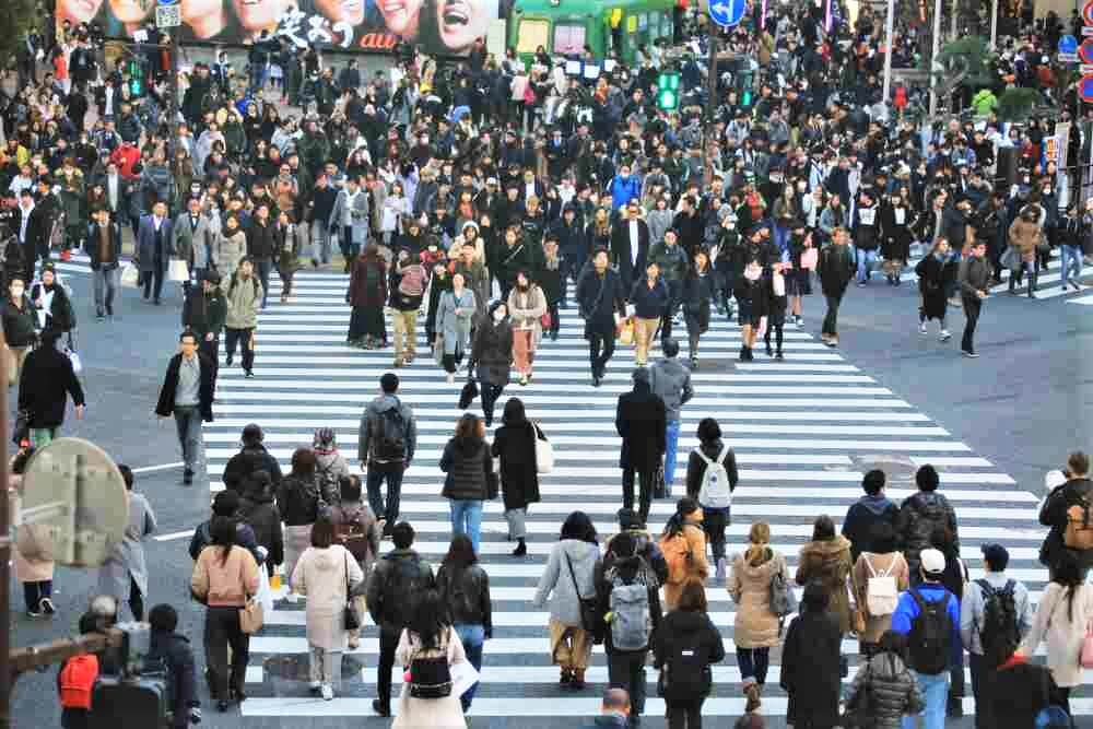 January 14 2018: japanese cross the road on Shibuya street, Tokyo, Japan = Shutterstock