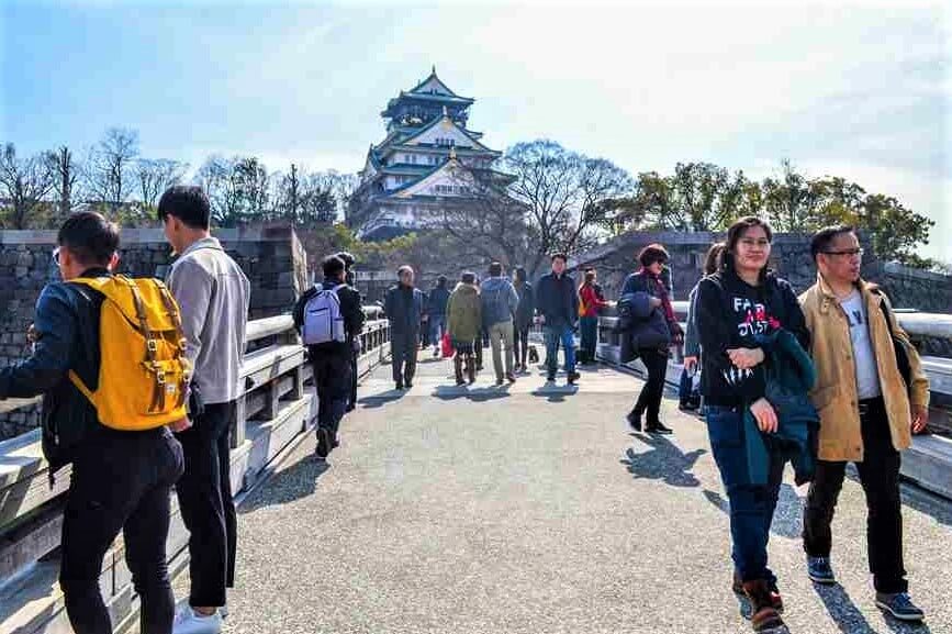 March 3 2019: Osaka castle Park and tourist, Osaka, Japan = Shutterstock