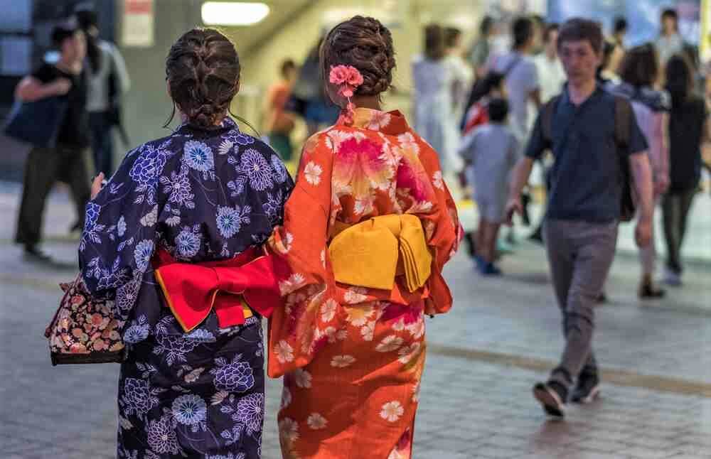 AUGUST 19TH, 2017. Young Japanese girls dressed in traditional yukata in the streets of Tokyo = Shutterstock