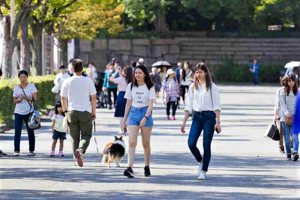 SEPTEMBER 18, 2017 : unidentified asian people visit Osaka castle park in Osaka, Japan = Shutterstock