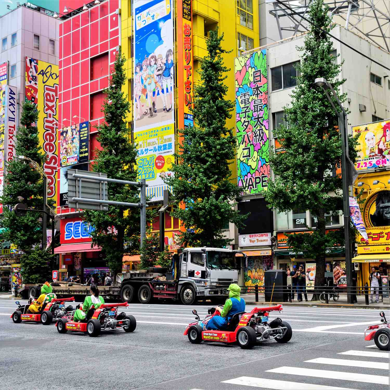cosplayers driving mario karts at tokyo streets = Shutterstock 2