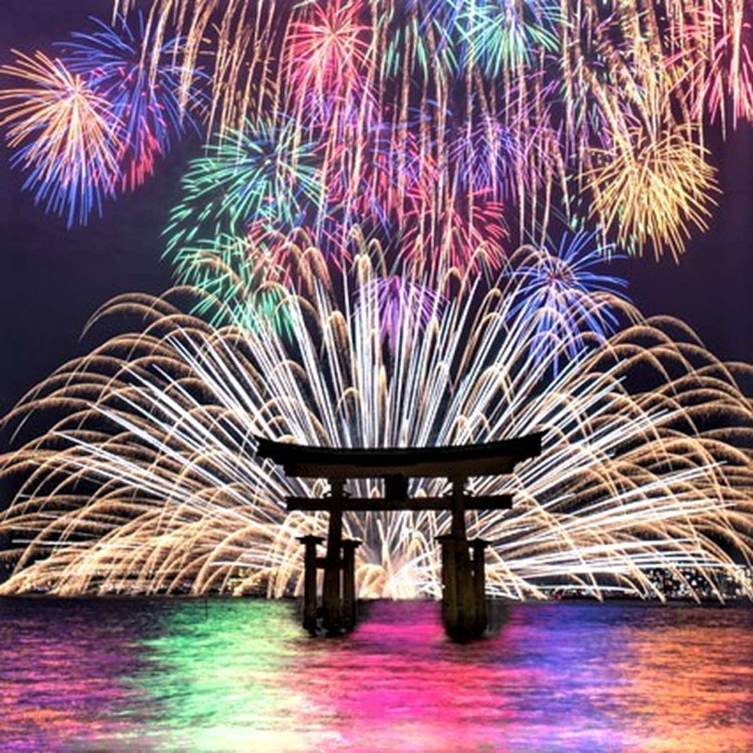 The contrast between the Torii gate of Itsukushima Shrine and the fireworks is beautiful =Pixta