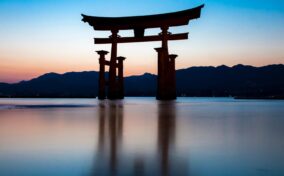 The torii gate of Itsukushima Shrine on Miyajima Island = Shutterstock 1