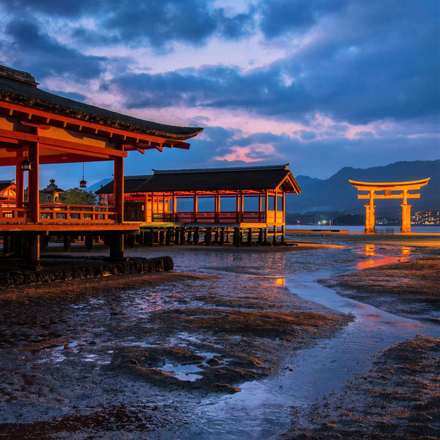 Beautiful sunset landscape view of Miyajima at low tide, Hiroshim Prefecture = Shutterstock 5