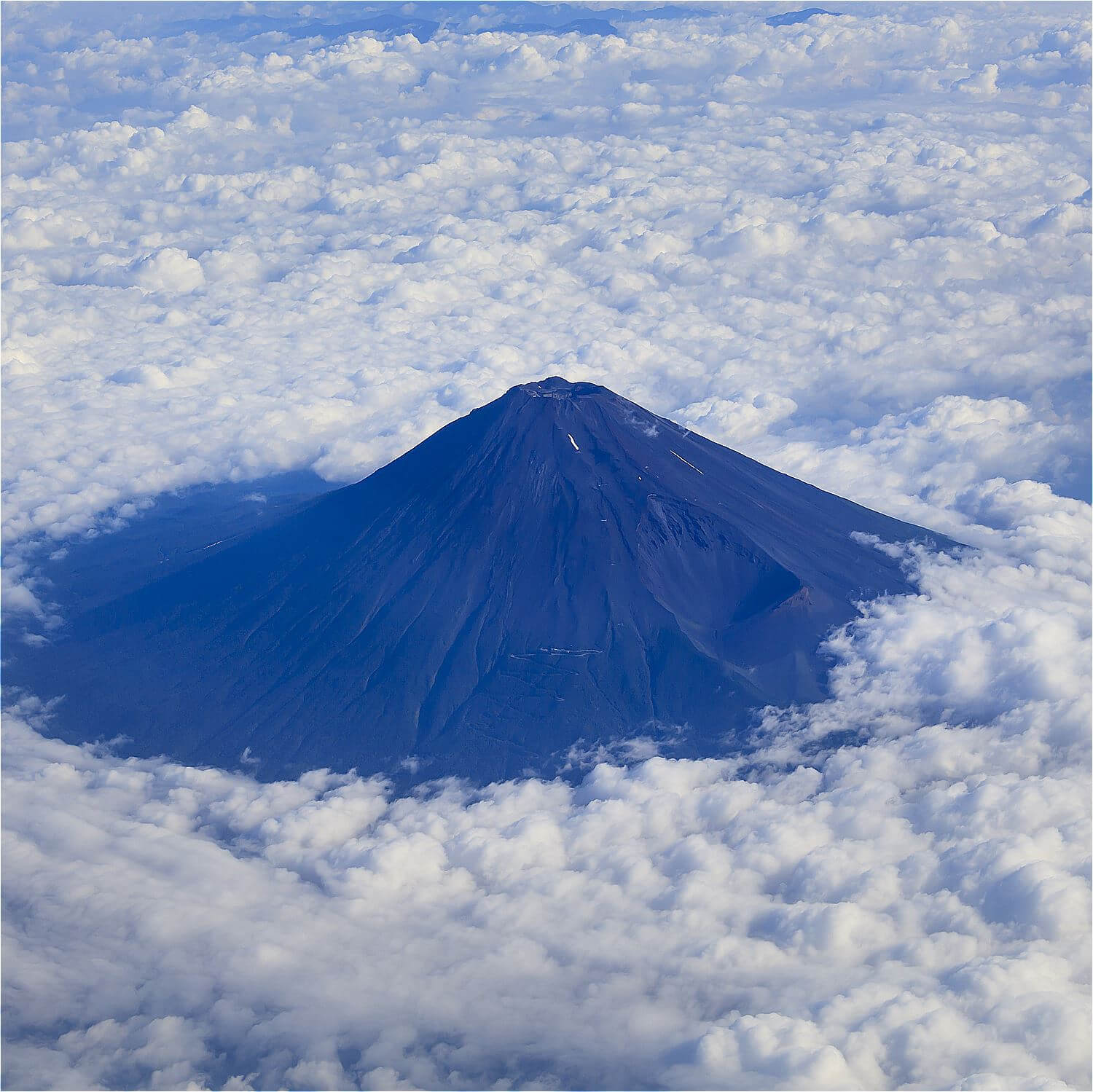 Climbing Mt. Fuji in summer = Shutterstock 1