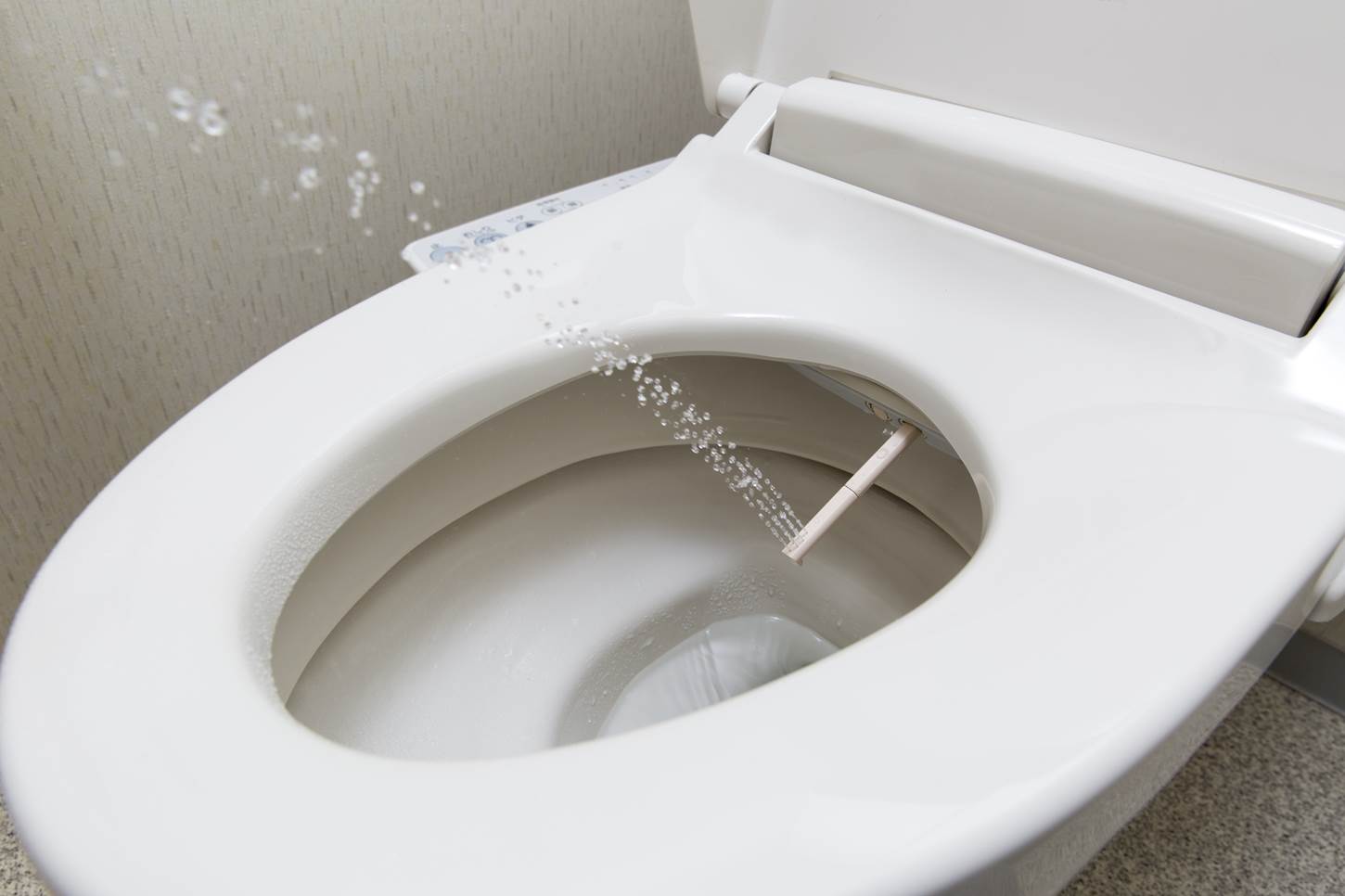 In a Japanese toilet, you press a button and hot water comes out to clean it = Shutterstock