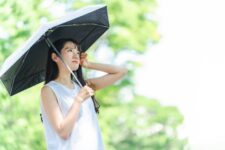 summer in japan, Woman using a parasol