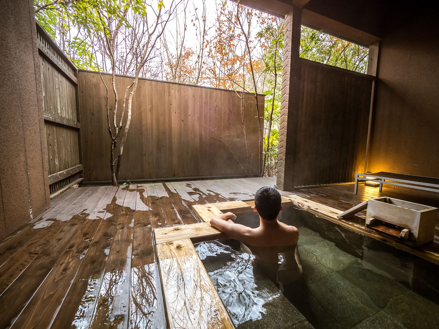 Many Ryokans (Japanese-style hotels) in Yufuin have elegant open-air baths = Shutterstock