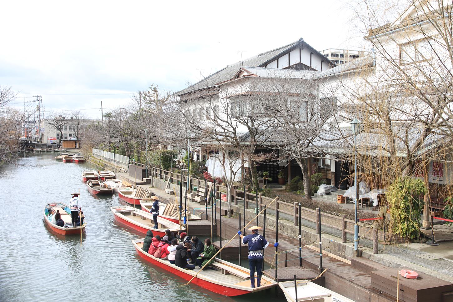  People Waiting for a Boat Ride. Yanagawa is a famous canal town in Kyushu island = Shutterstock